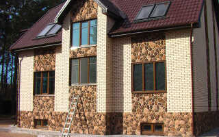 Отделка фасада дома панелями под камень – варианты и фото