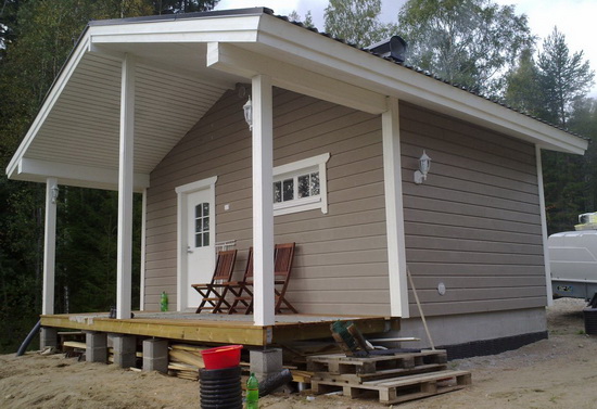 Отделка фасада деревянного дома 1