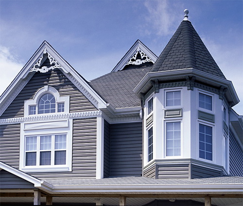 Отделка фасада дома сайдингом 8