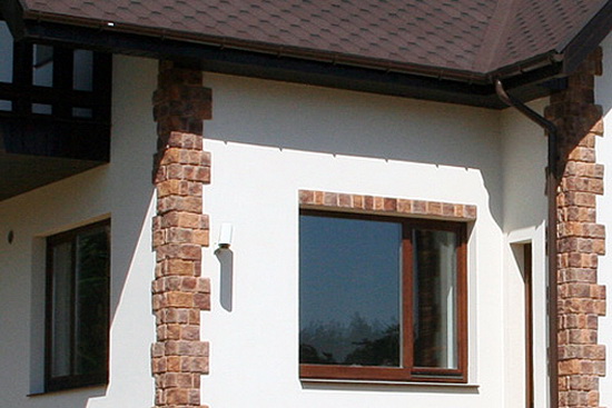 Отделка фасада дома штукатуркой 1