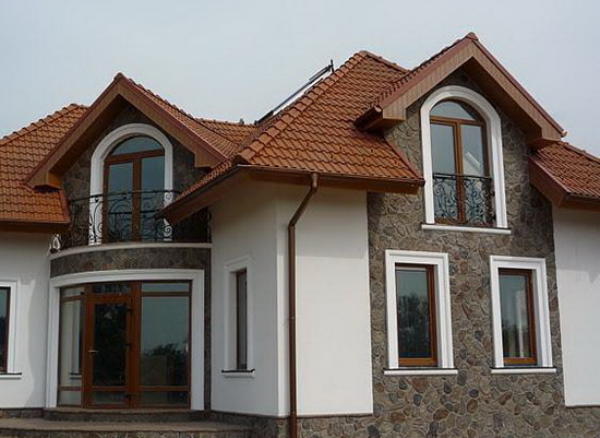 Отделка фасада дома штукатуркой 4