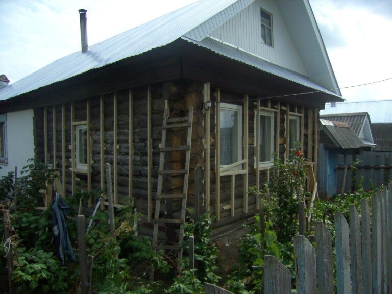 обшивка сайдингом бревенчатого дома