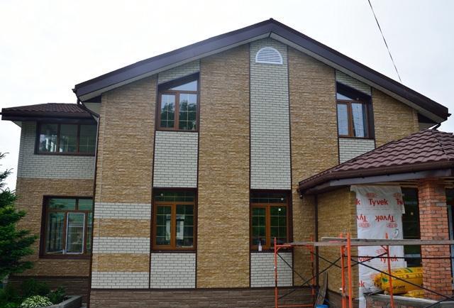 отделка фасада дома панелями под камень фото 8