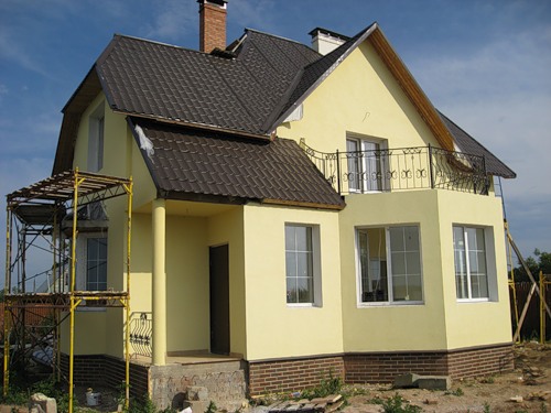 отделка фасада дома штукатуркой